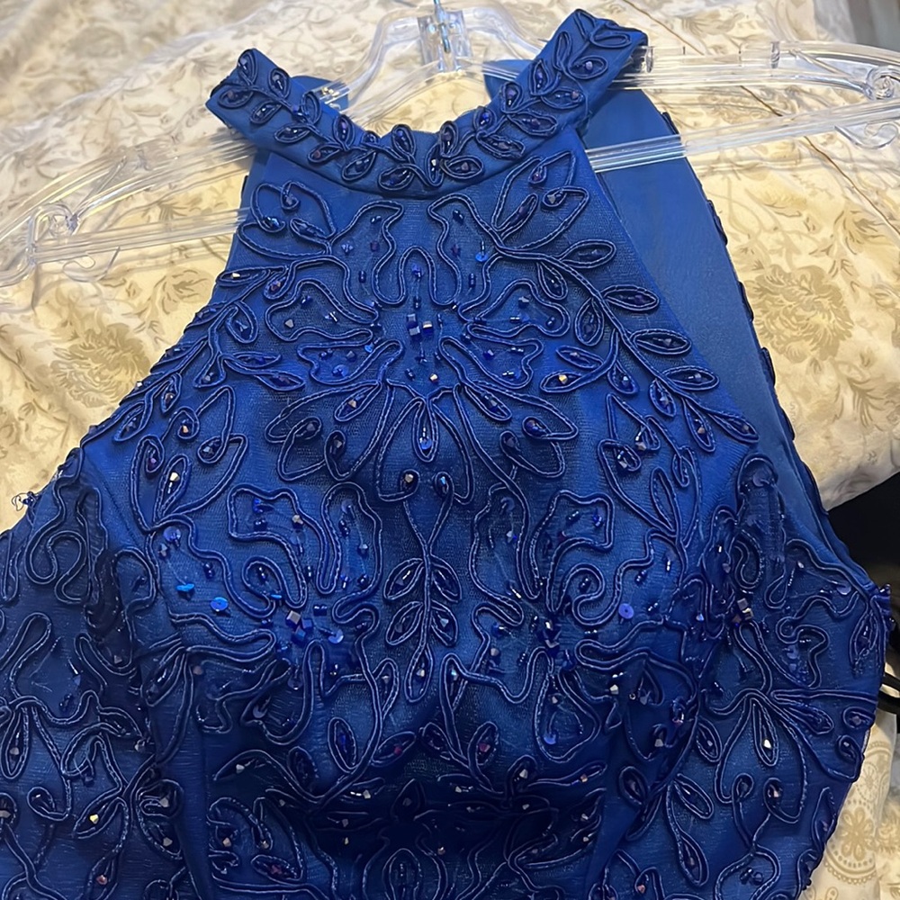 Long Formal, Prom, Gown. 3 layers of tool to add a ballon like bottom flare.